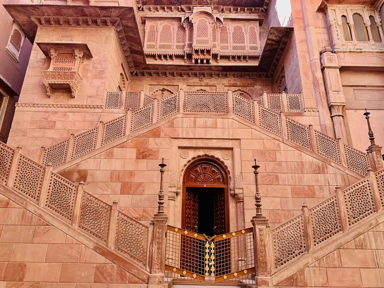 A carved sandstone haveli facade in Bikaner