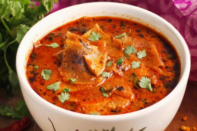 Papad simmered in a yoghurt gravy