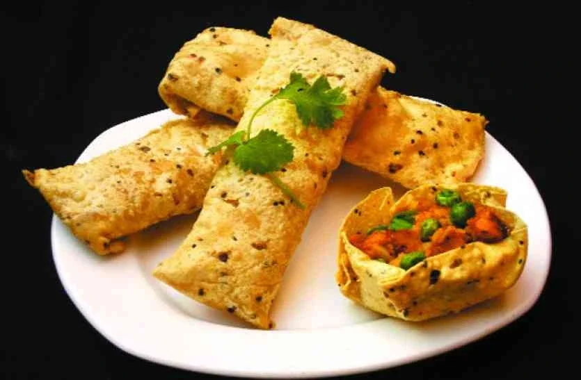 Moong dal papad with crushed red chilli through it